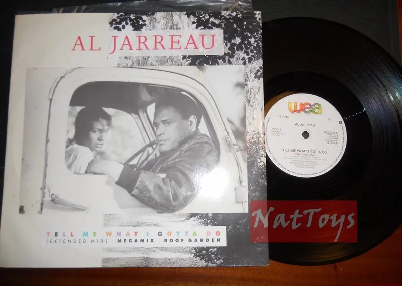 12" 33 GIRI Al Jarreau TELL ME WHAT I GOTTA DO (U.K. 1986, WEA U8523TX) - NM/NM