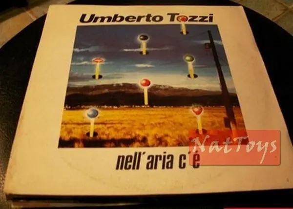 7" 45 GIRI Umberto Tozzi NELL'ARIA C'E'/COME UN CARILLON (Italy 1983) - NM/NM